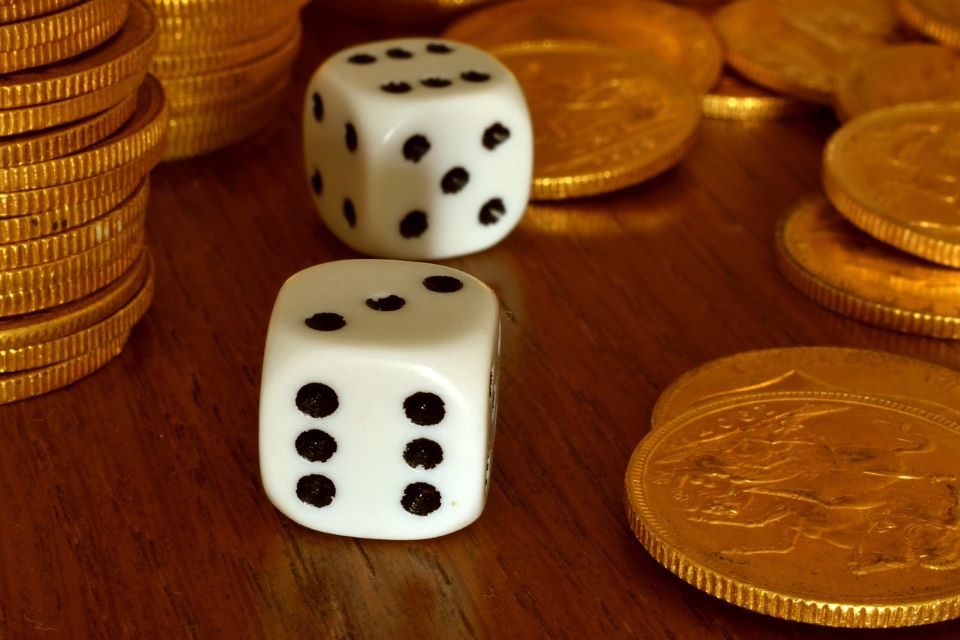 Dice and gold coins